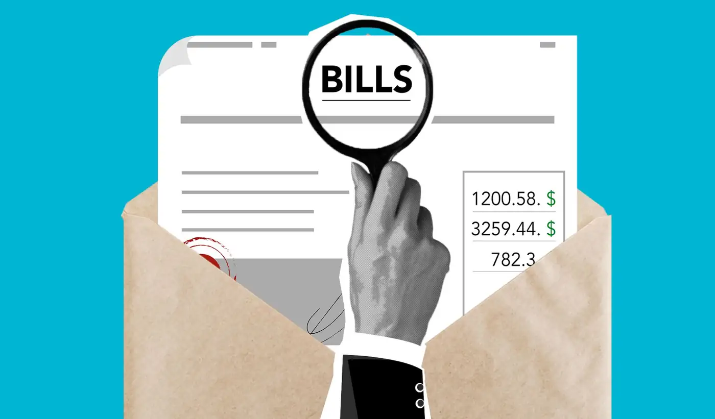 Hóa đơn y tế và máy tính tiền đặt trên bàn — bác sĩ có nhận assignment của Medicare hay không quyết định số tiền cuối cùng quý vị phải trả